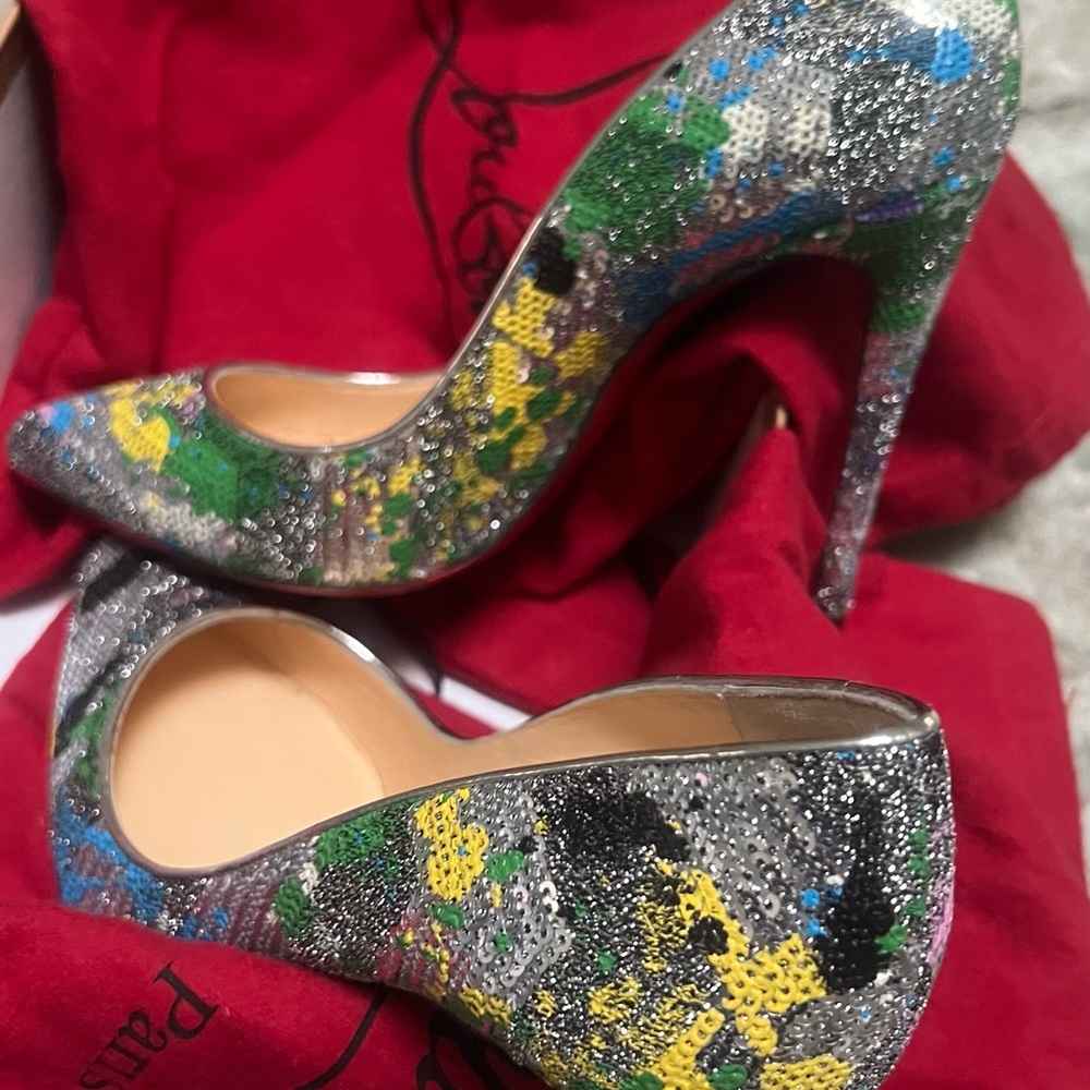Christian glitter Louboutin pumps. Wore them twice, great for the holidays.